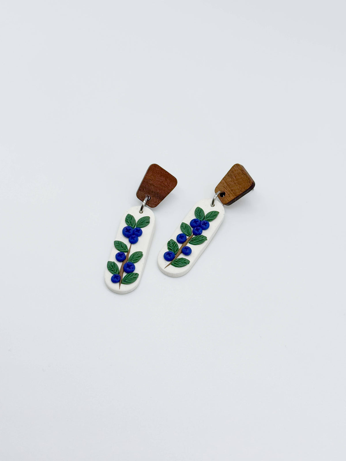 Blueberry Dangles on Wooden Posts